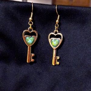 Vintage gold tone opal like heart in key earrings
